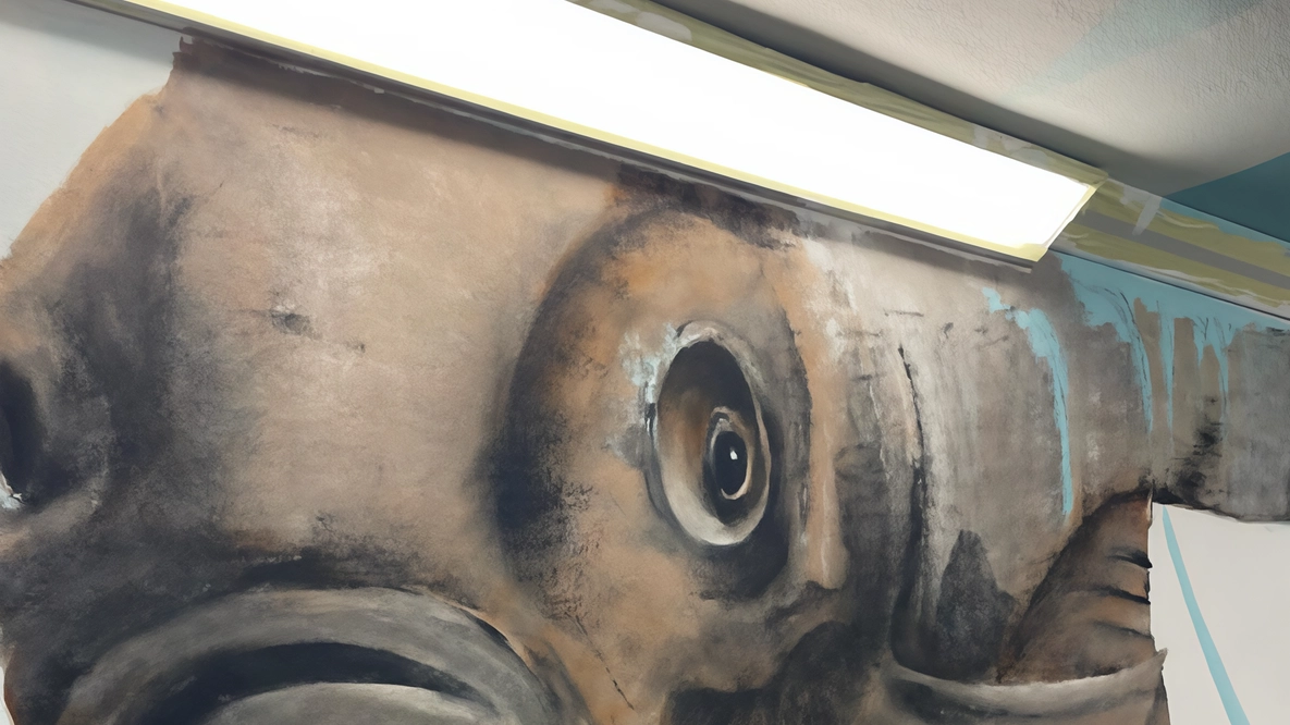 Artisti all’opera per i murales nel sottopasso