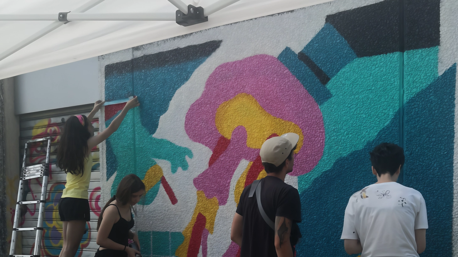 Lezioni con uno street artist: il murale dei giovani al Cubotto