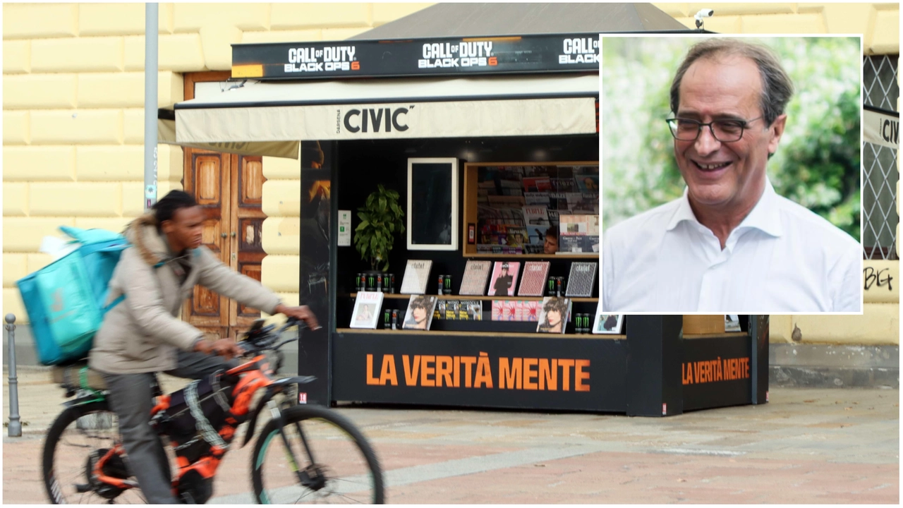 Un'edicola Civic e, nel riquadro, Marco Ravetta